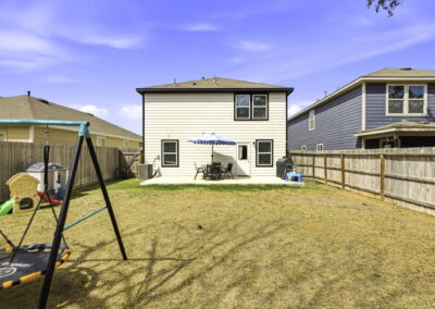 spacious backyard with extended back patio at 7342 Storms End in far West San Antonio