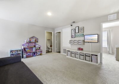 play room + game room at 7342 Storms End in Winding Brook near Harlan High School