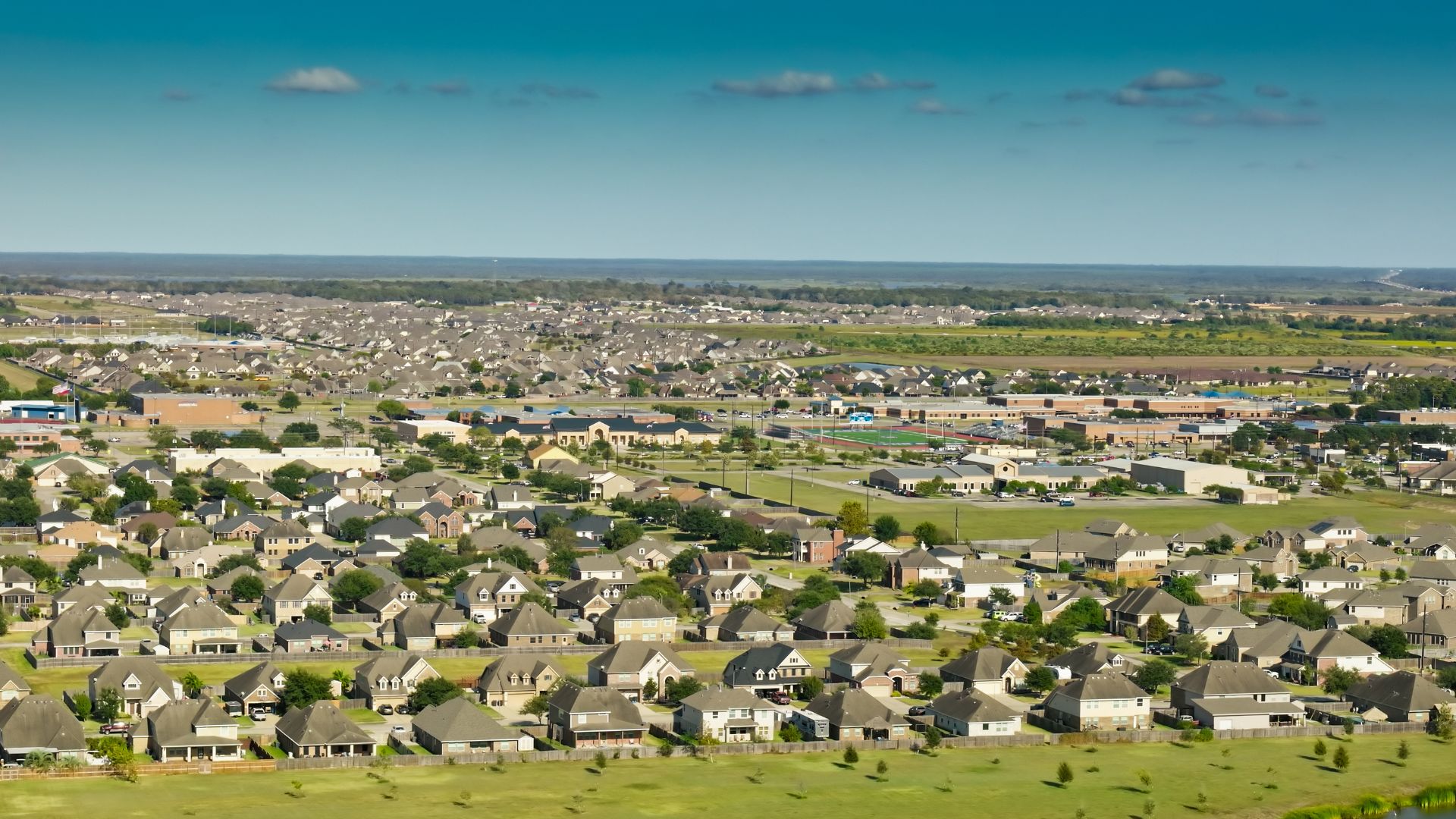 Aerial view of a residential neighborhood near Fort Sam Houston in San Antonio Texas showing tree-lined streets and established homes Title: Off-Base Housing Near Fort Sam Houston — San Antonio Neighborhoods
